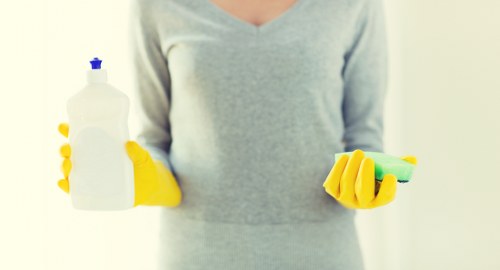 Cleaning different hard floor types in a Brixton property
