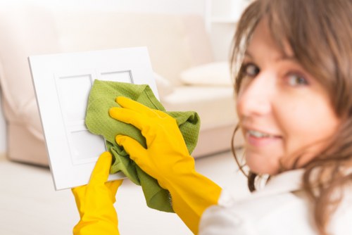 Cleaner completing appliance cleaning at a customer property
